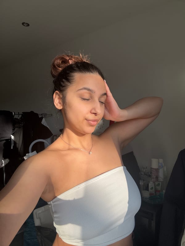 Woman poses for indoor photograph in Mönchengladbach