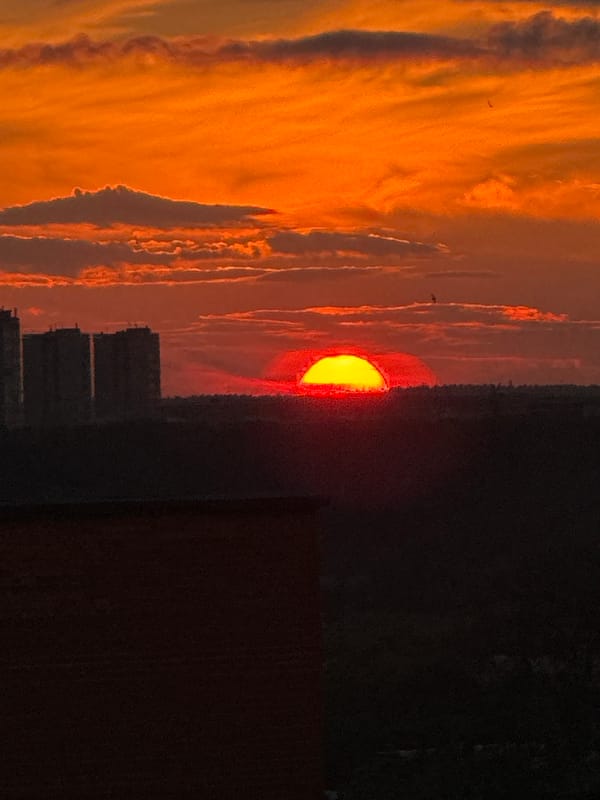 Vivid orange sunset over the Yekaterinburg skyline