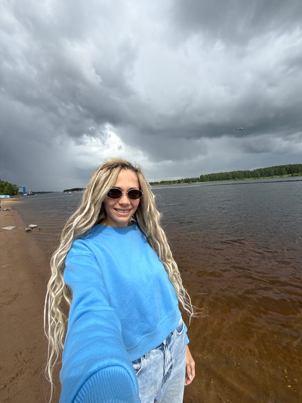 Mother and child enjoy morning photo session at Russian lakeside