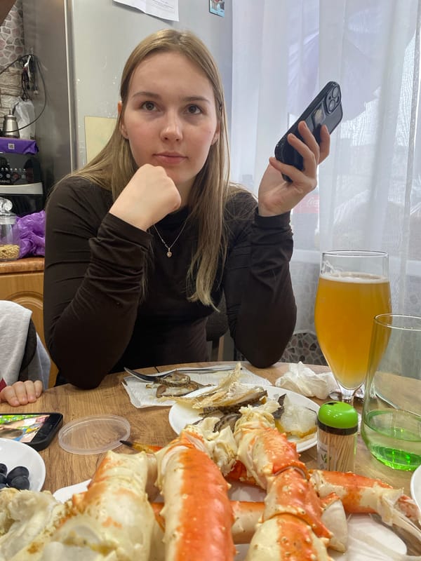 Woman shares quiet afternoon with cat in Murmansk home