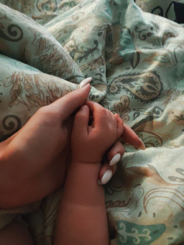 Quiet moment between a baby and caregiver, Voronezh