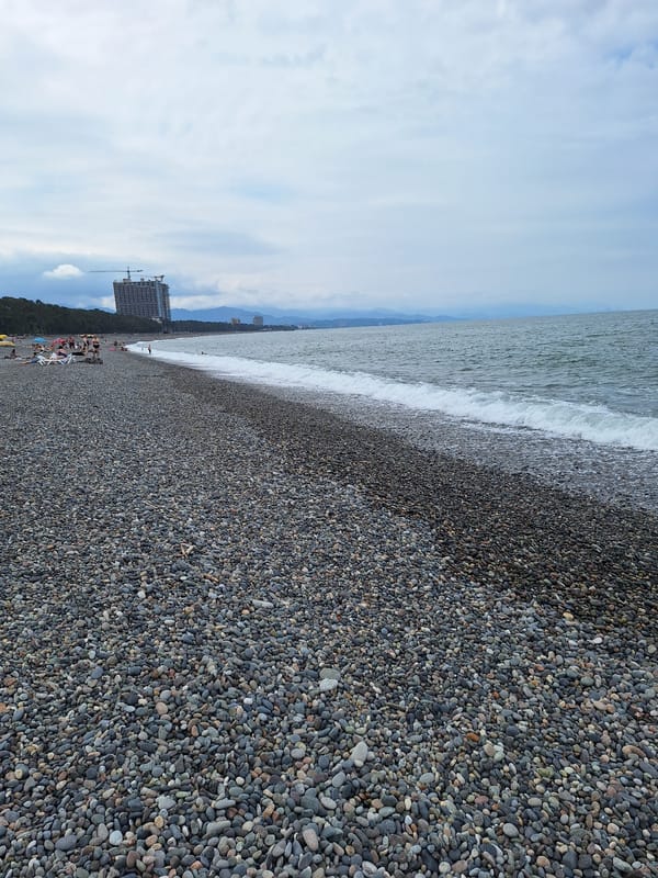 Cloudy morning on the pebble beach in Kobuleti, Georgia