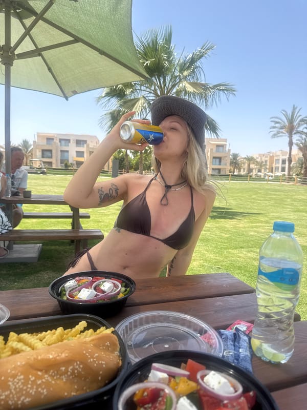 Woman enjoys outdoor meal at El Gouna resort