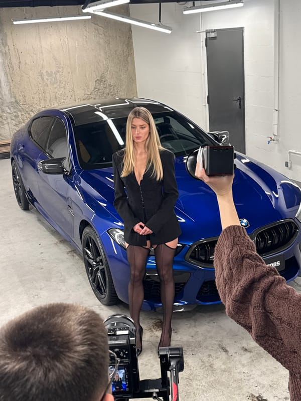 Commercial photo shoot at Warsaw BMW dealership features model