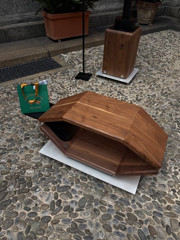 Outdoor promotional event with floral displays documented in Milan