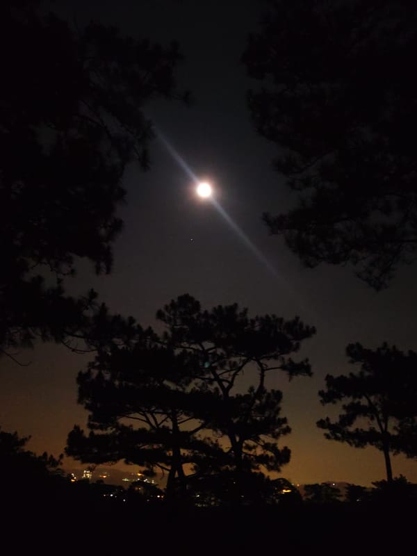 Bright full moon captured over Da Lat Vietnam countryside
