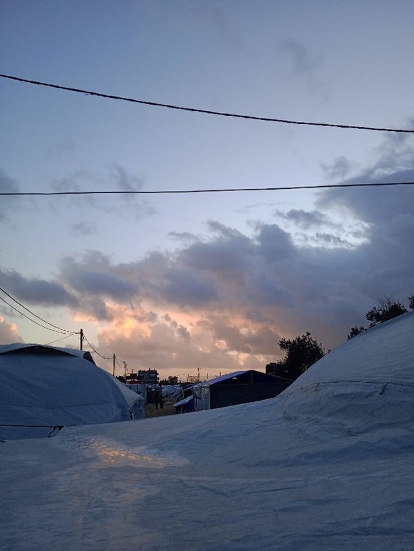Displacement camp documented at dusk in Khan Yunis
