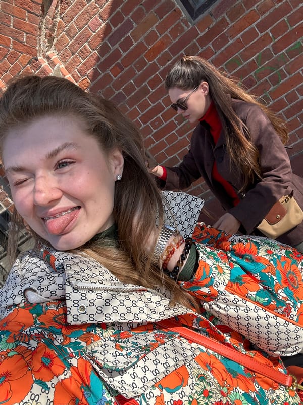 Women photograph themselves exploring Kazan on spring morning