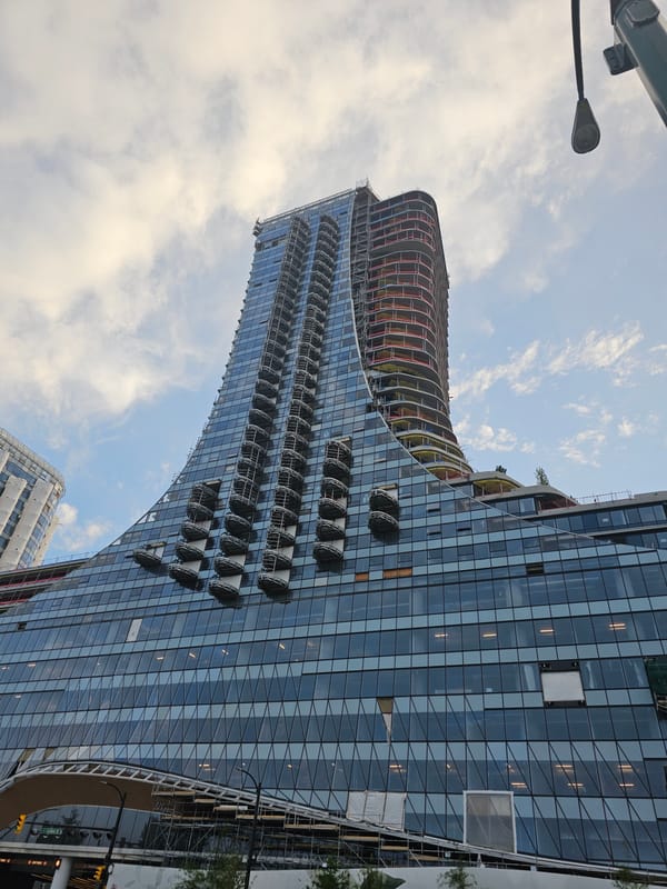 Vancouver's curving glass tower under construction, balconies and all