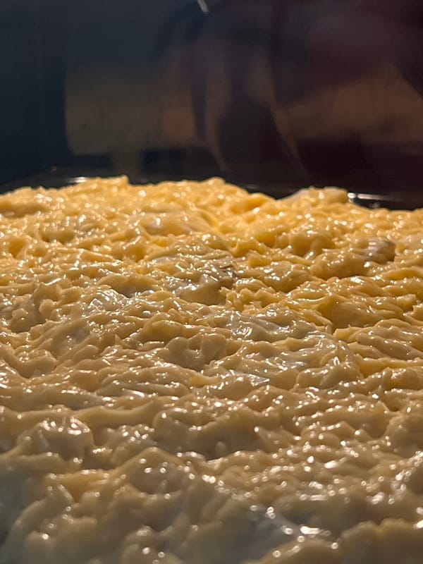 Yellow-frosted dessert documented in close-up food photography