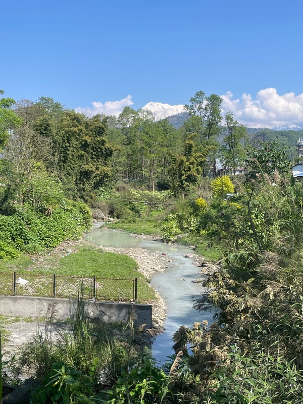 Milky river waters documented near Pokhara, Nepal tributary