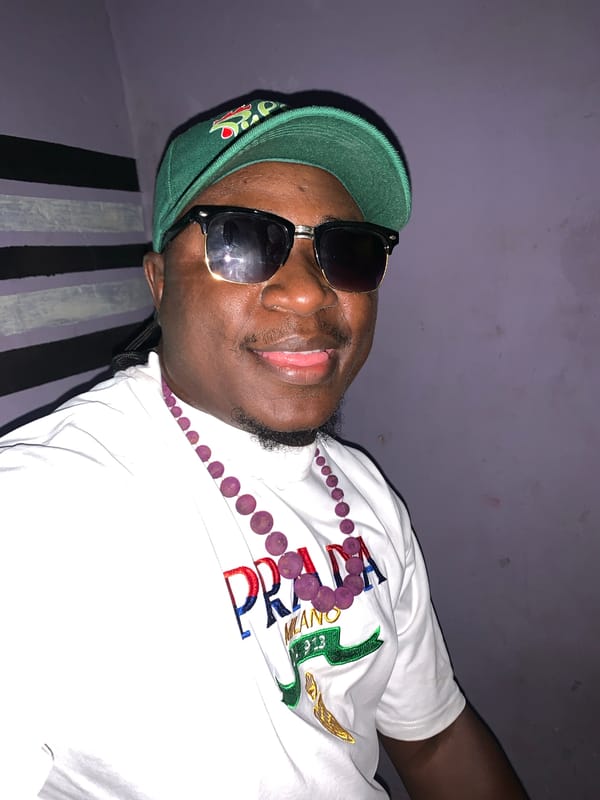 Man in Africa cap photographed indoors in Akwanga