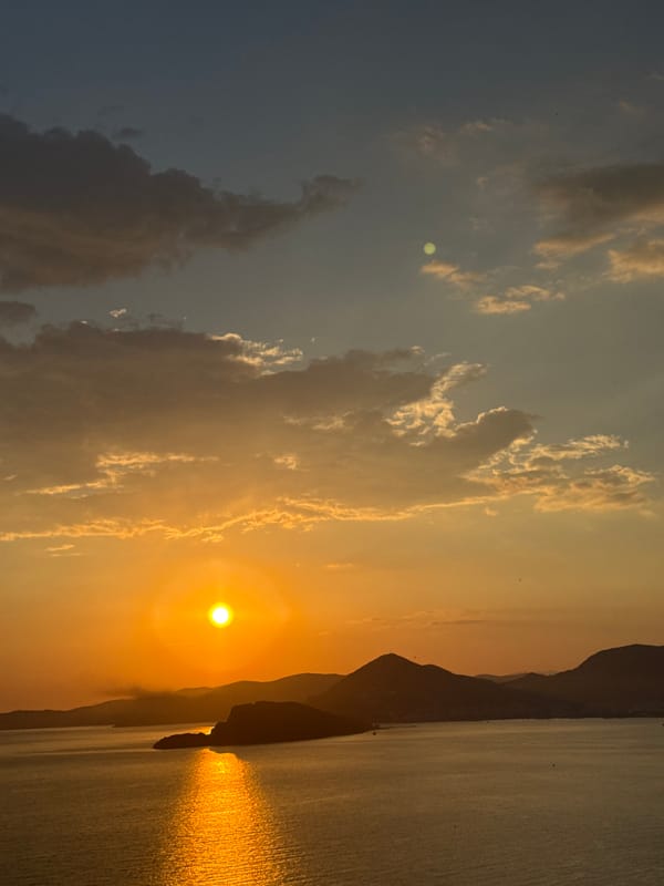 Sunset observed over water near Sveti Stefan, Montenegro