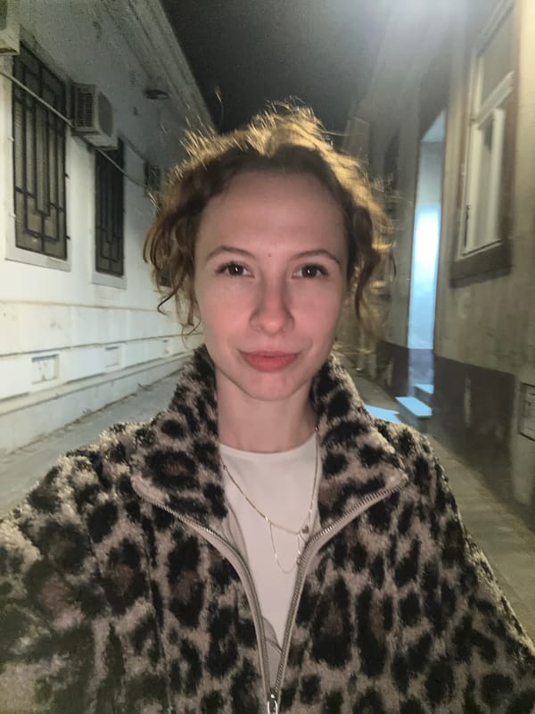 Woman takes nighttime selfie in Novi Sad, Serbia