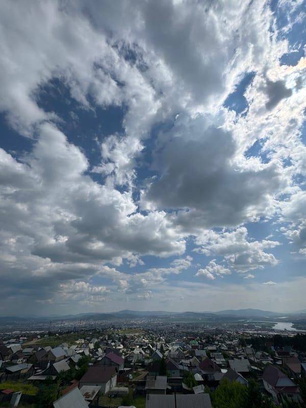 Ulan-Ude's hillside suburbs seen from above and ground level