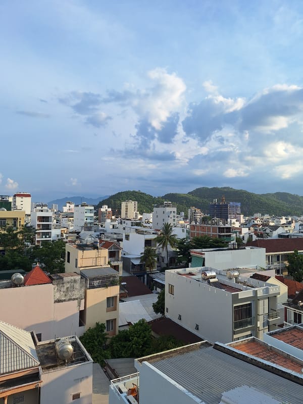 Rooftop views and street scenes across Nha Trang's urban coastline