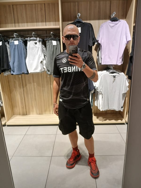 Mirror selfie fit check inside a Blagoevgrad clothing store