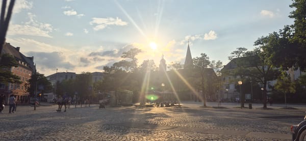 Ingolstadt landmarks at golden hour, sunset light and spires