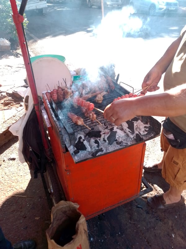 Street vendor and car dealership scenes documented in Ciudad del Este