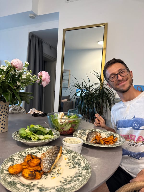 Man with glasses observed dining at Tel Aviv apartment table