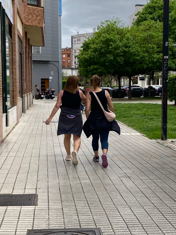 Person documents routine afternoon in coastal Gijón, Spain