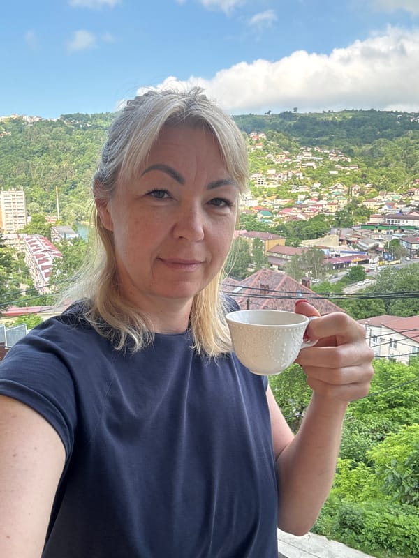 Woman documents morning breakfast routine with coffee in Sochi