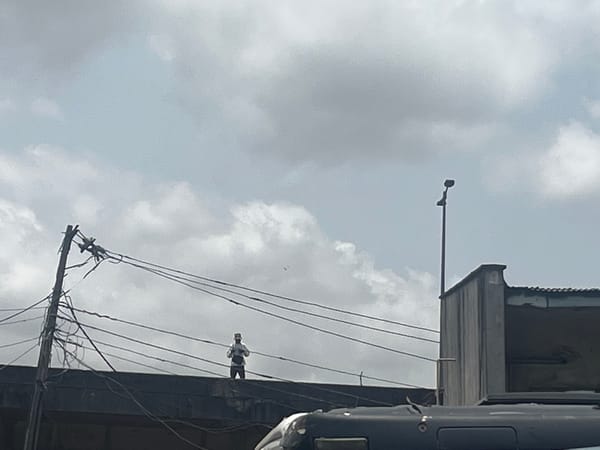 Man observed on concrete structure in Lagos