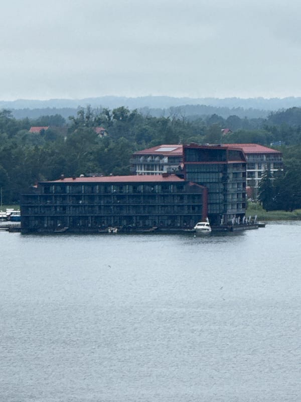 Mikołajki marina and lakefront from ground and aerial views