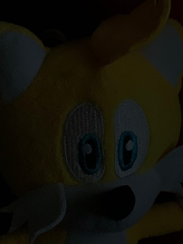 Sonic plush toys photographed in dimly lit Russian home