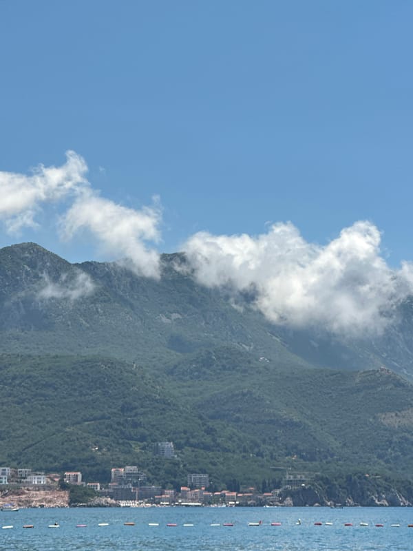 Parasailing and beach activity along the Boreti coastline