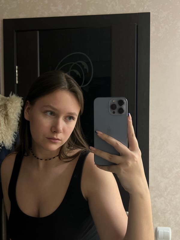 Woman takes mirror selfie in Chaikovsky, Russia