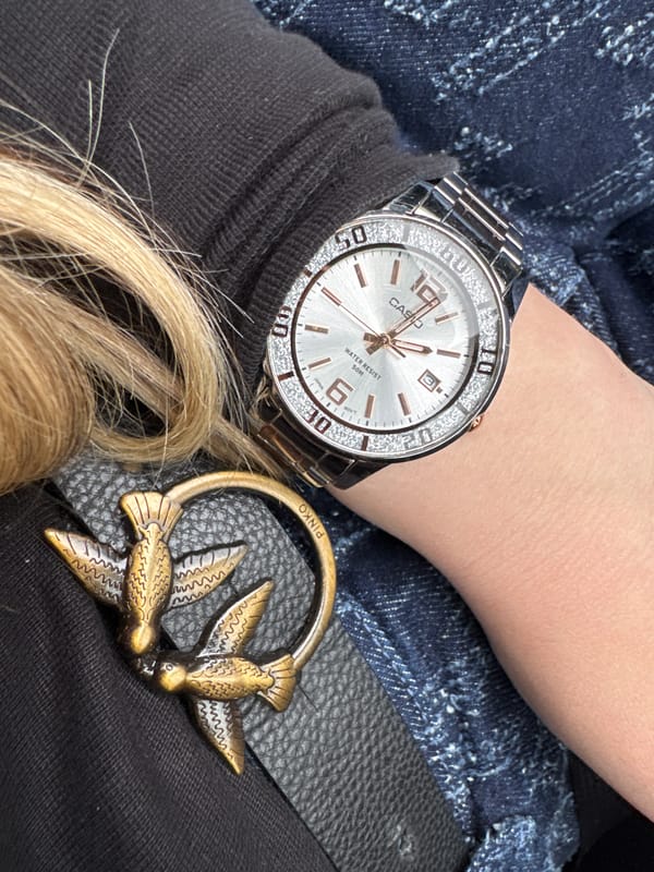 Woman photographed in car wearing crystal Casio watch in Bulgaria
