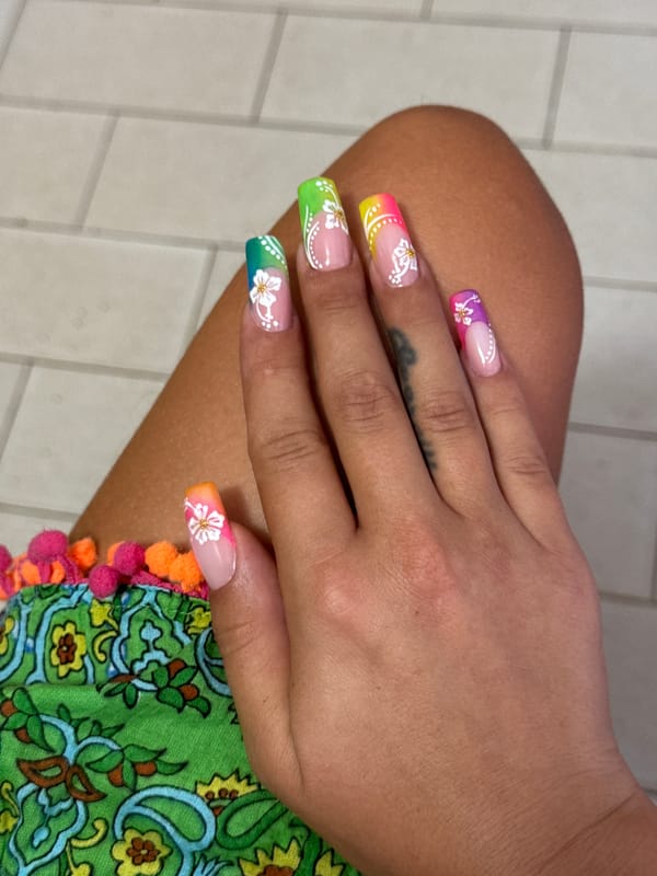 French Bulldogs and rainbow nails at home in coastal Italy