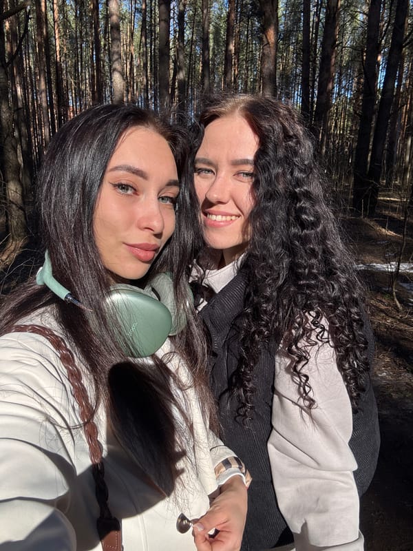 Women take forest selfies with dog in Chaikovsky
