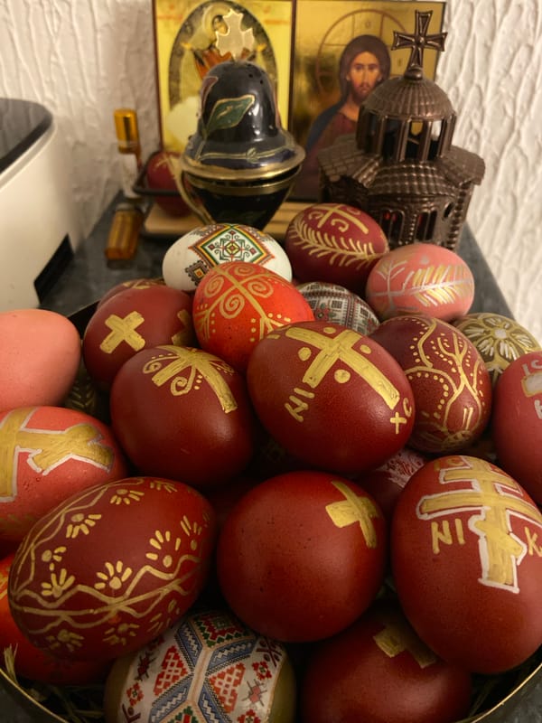 Woman styles hair in bathroom in Sutomore, Montenegro