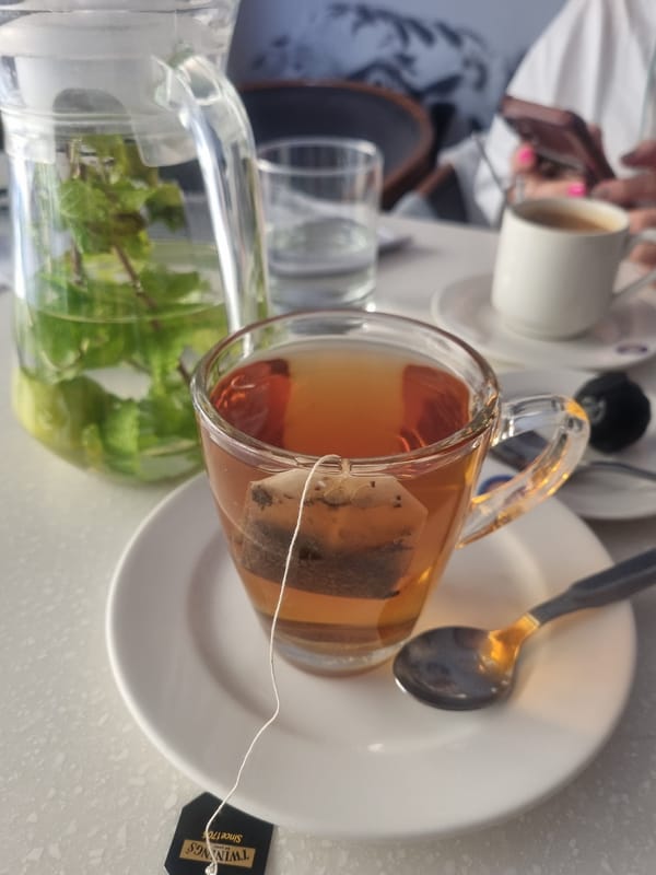 Tea preparation documented with Twinings brand and mint water