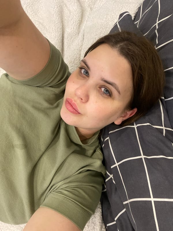 Young woman takes indoor selfie in Chernushka, Russia