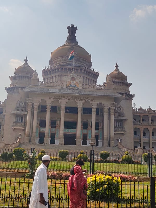 Vidhana Soudha observed through landscaped gardens in Bengaluru