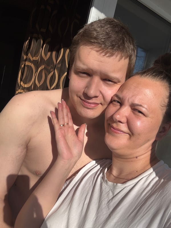 Family shares morning coffee moment in Dmitrov, Russia