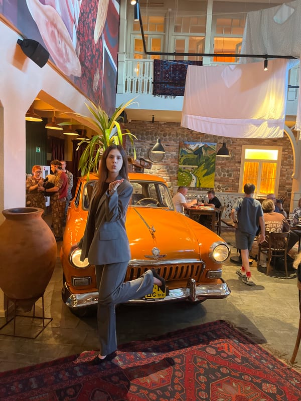 Lunch at an elaborately themed restaurant with a vintage car inside
