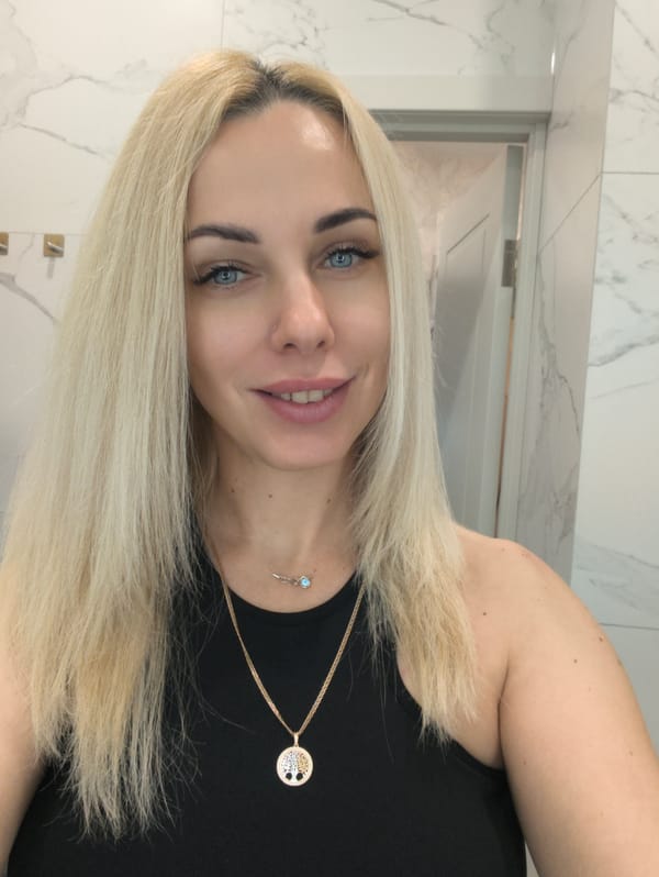 Woman's morning routine captured in Krasnodar selfie and grooming
