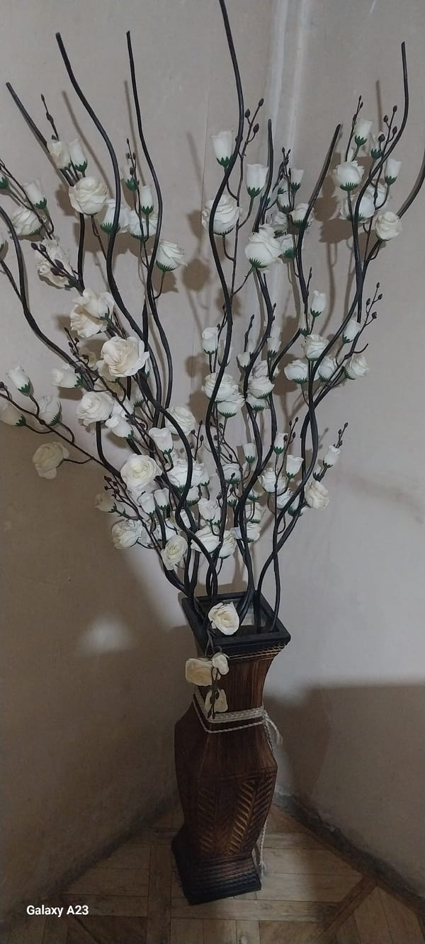White rose arrangement displayed in decorated vase in Armenia
