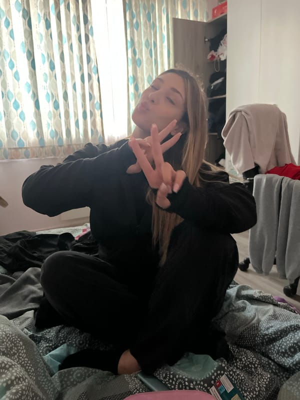 Woman poses for indoor photo in Varna bedroom