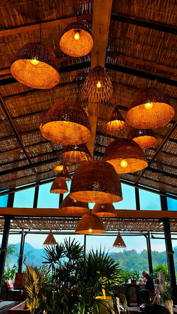 Travelers document dining experience at Hà Giang mountain hostel restaurant