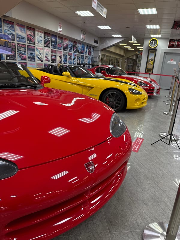 Luxury car collection displayed at Sirius Russia automotive showroom
