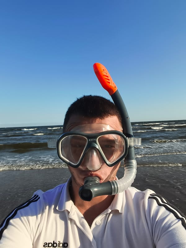 Snorkeling prep on a sunny Baltic beach in Latvia