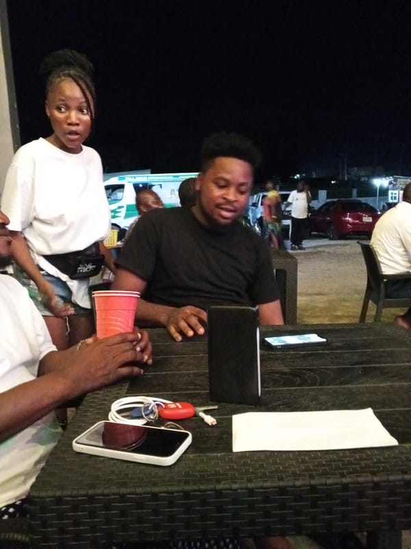 Evening social gathering documented at outdoor venue in Lokoja