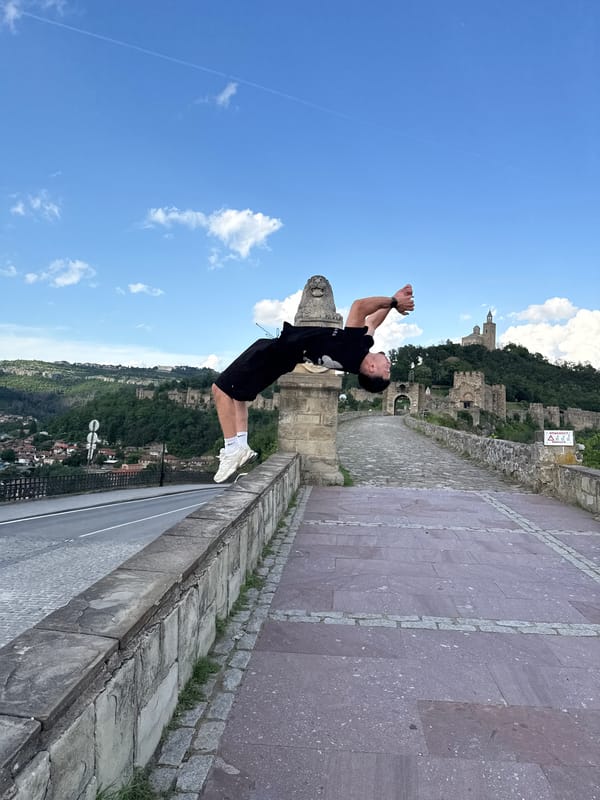 Tourist documents medieval fortress visit in Veliko Tarnovo, Bulgaria