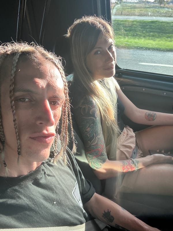 Two people rest inside vehicle in Argentina