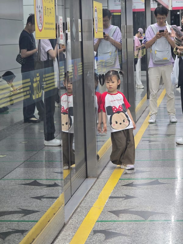 Morning commuters navigate Hangzhou Metro stations during rush hour